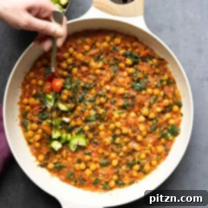 Peri Peri Pan Roasted Chickpeas 7 adding the salsa to the peri-peri chickpeas in the pan after cooking
