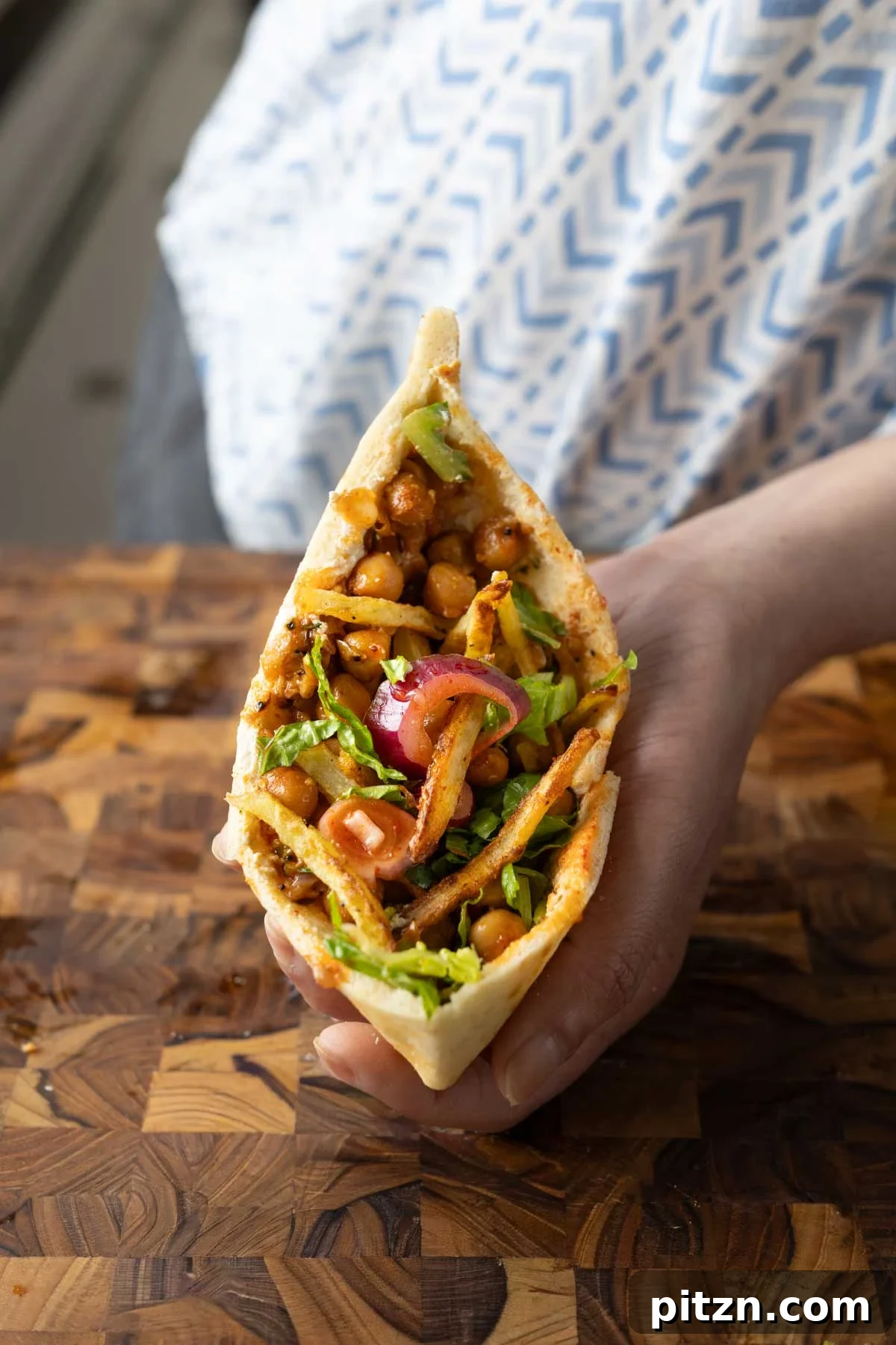 pita made with chili garlic chickpeas and crispy potatoes
