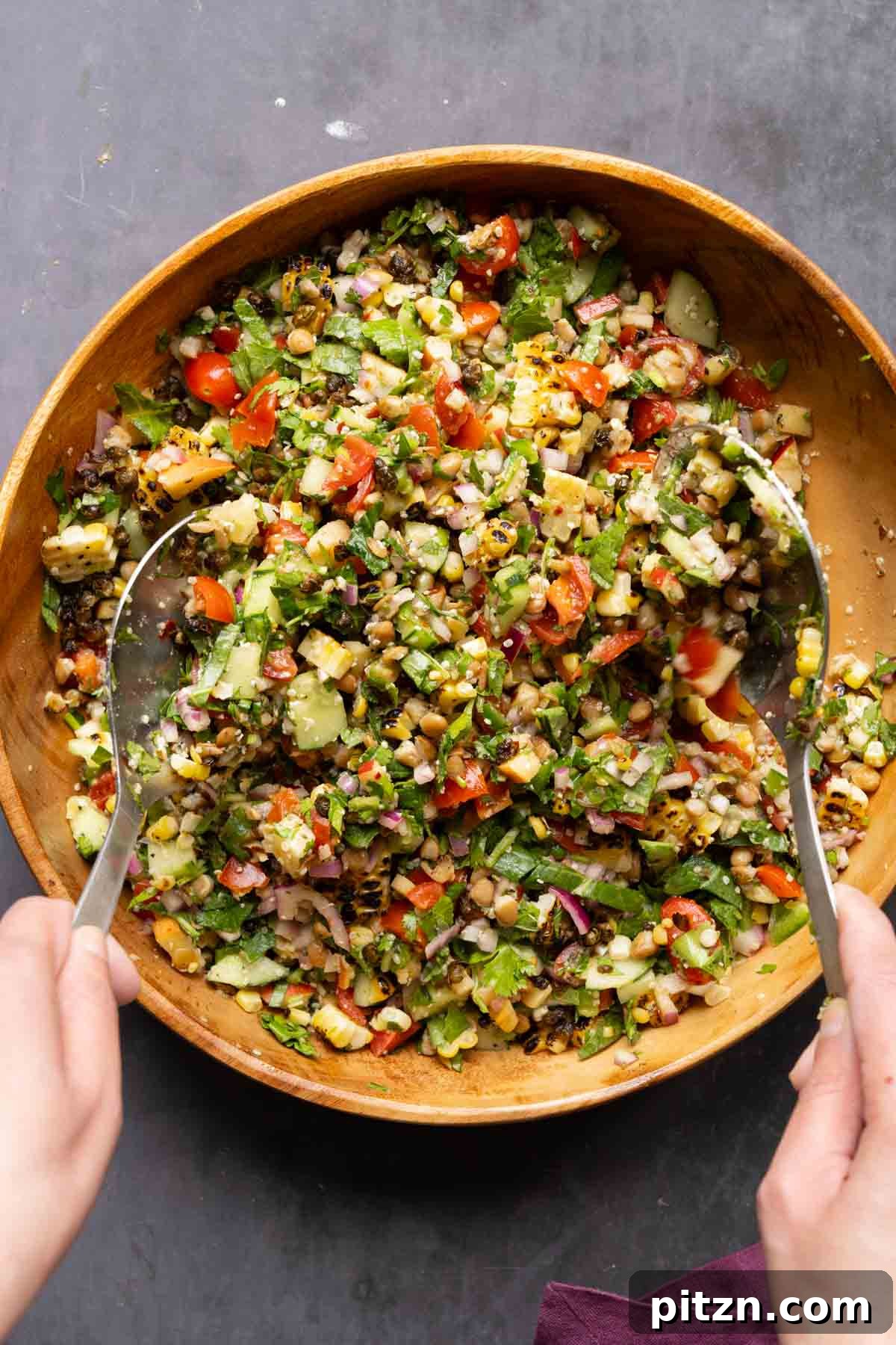 tossing lentil dip together in the bowl
