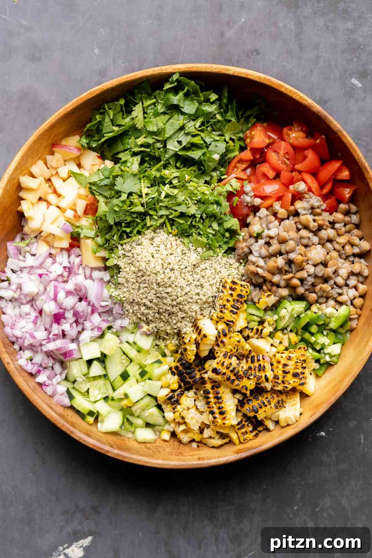 lentil dip ingredients in a bowl before adding the dressing