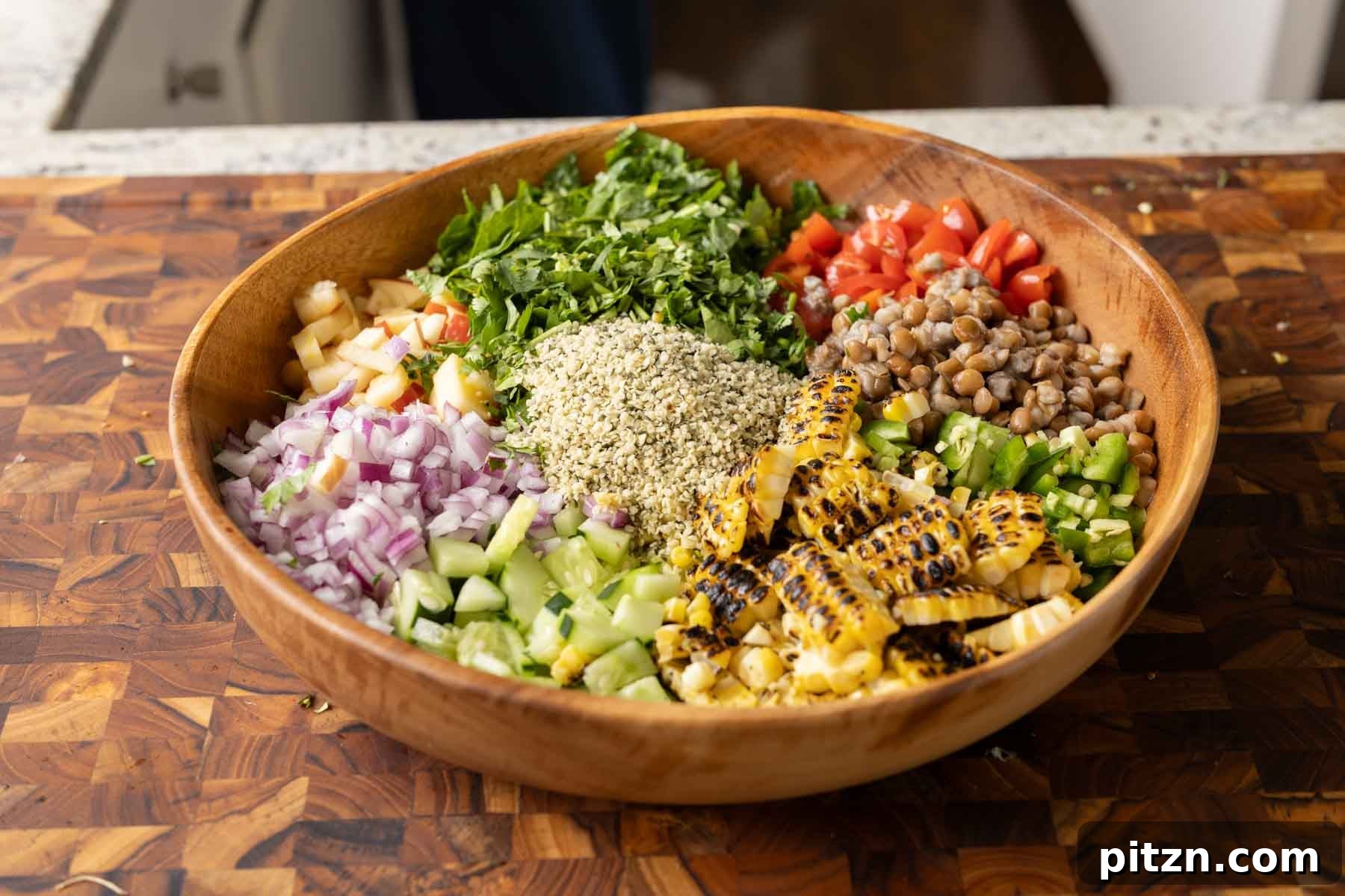 lentil dip ingredients in a bowl before adding the dressing