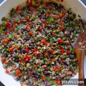dense bean salad in the bowl after mixing